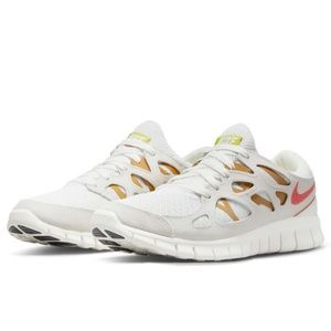 BNWOT women’s Nike free run white summit rush orange sneaker Size US 7, EU 38
